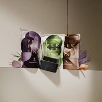 Edizione limitata: coppetta nera + palline da doccia Refresh, Calm e Gingerbread